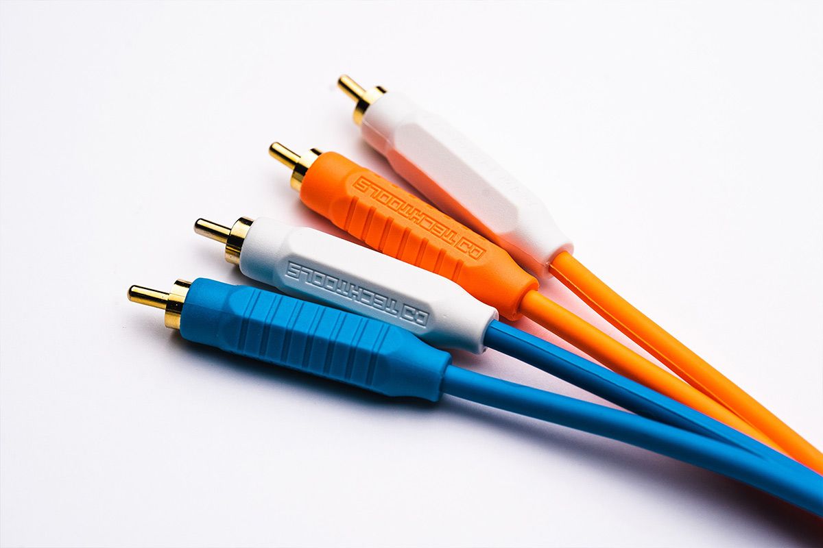 Two new RCA Chroma Cables, a blue one on the bottom and a orange one on the top.