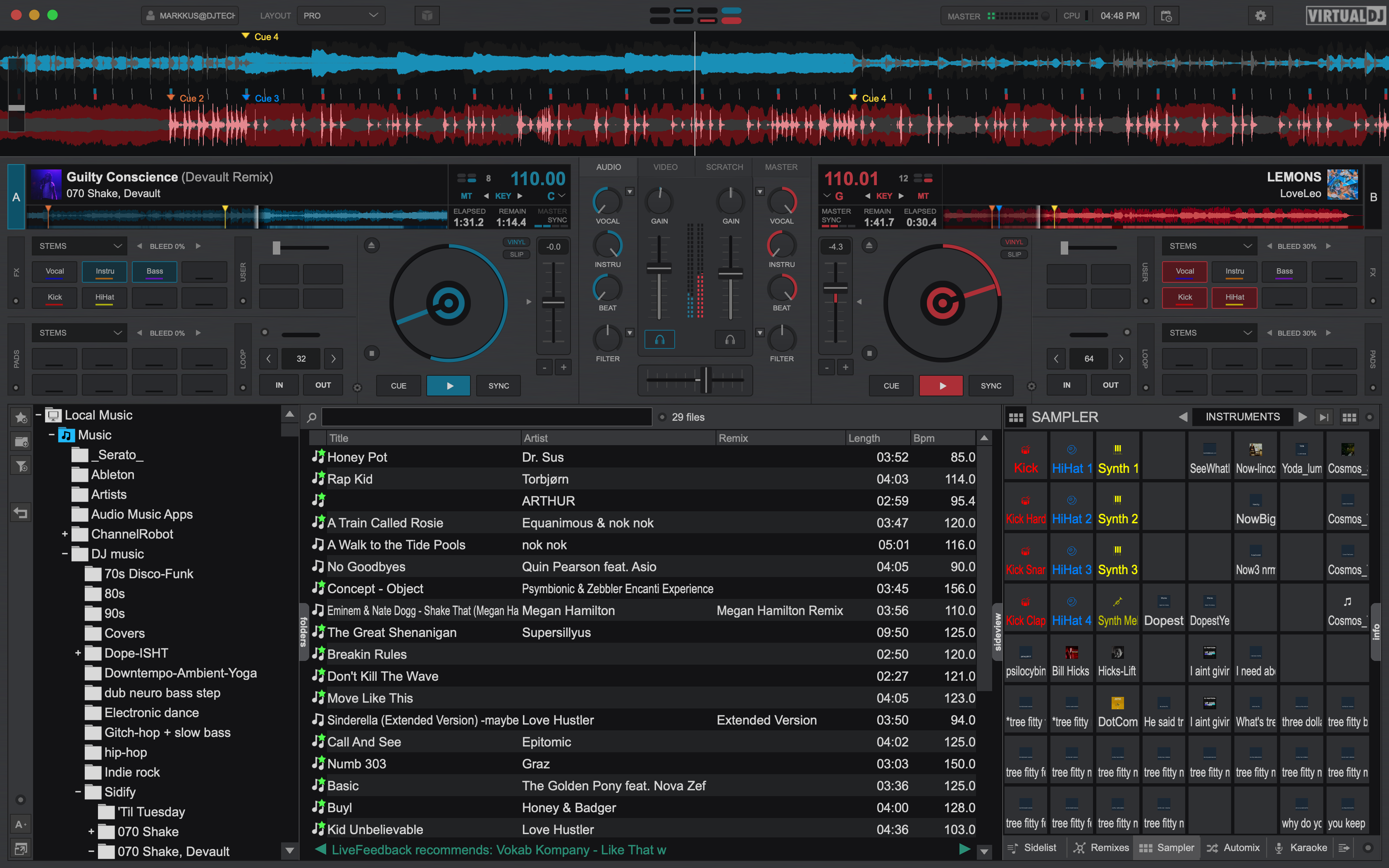The VirtualDJ2021 default skin showing Stems assigned to the deck pads and the EZRemix mode assigned to the channel EQ knobs.